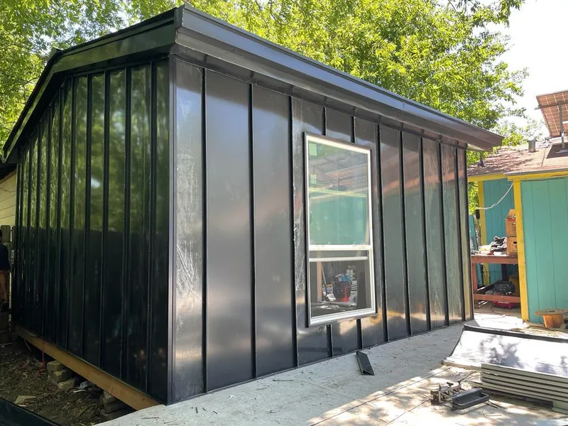 Black standing seam metal wall panels for Roof Inspection in Florence